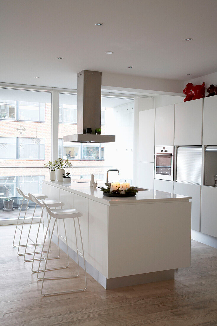 Modern kitchen with view to balcony