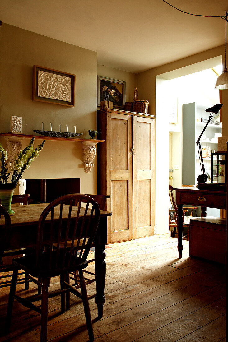 Wood dining table in Brighton home, UK