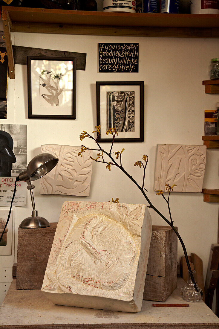 Plaster cast and vintage lamp with artwork in Brighton home, Sussex, UK