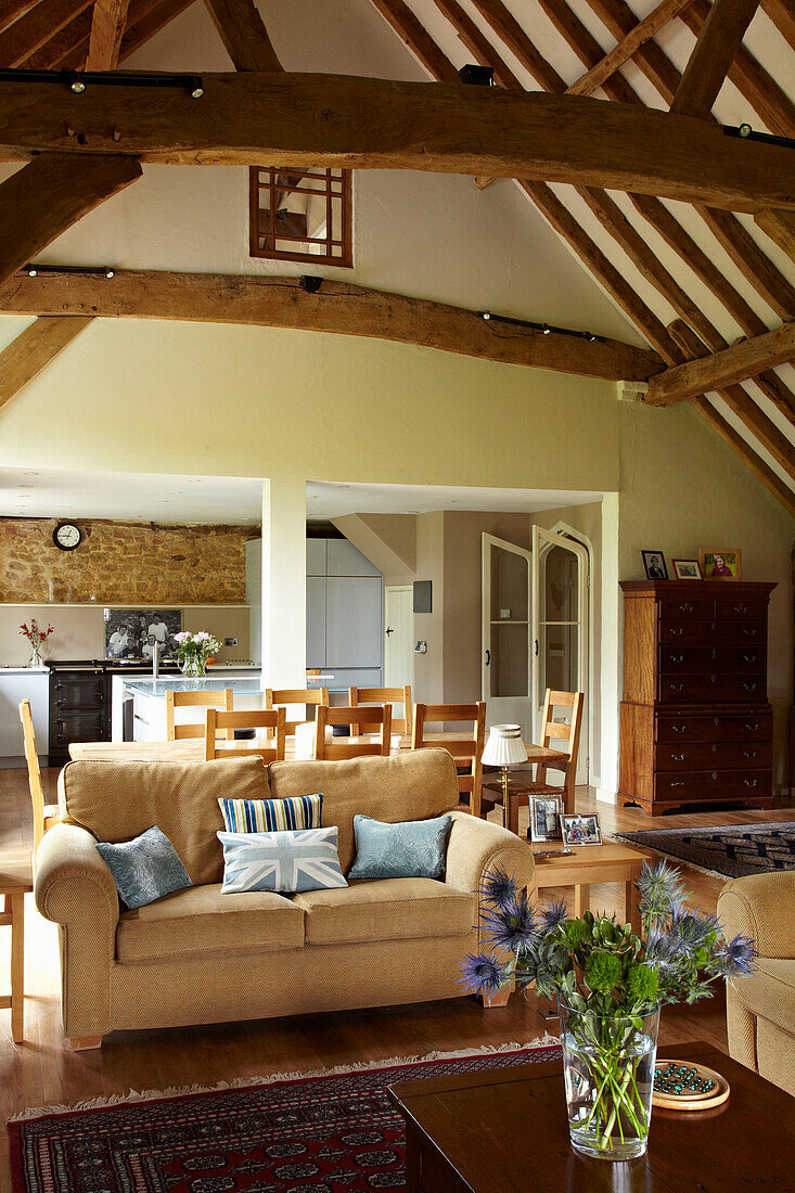 Open plan living and dining room in West Sussex home, England, UK