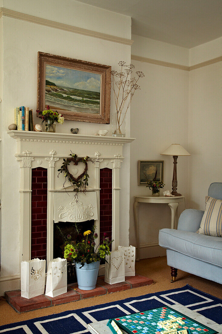 Tiled fireplace in Norfolk beach house, UK