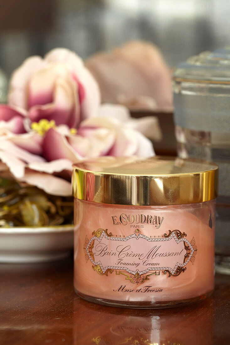 Moisturiser and cut flowers in Lincolnshire home, England, UK