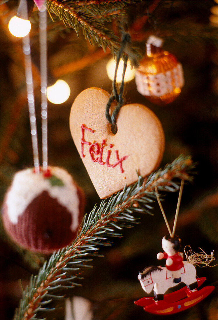 A detail of edible Christmas decorations on a Christmas tree