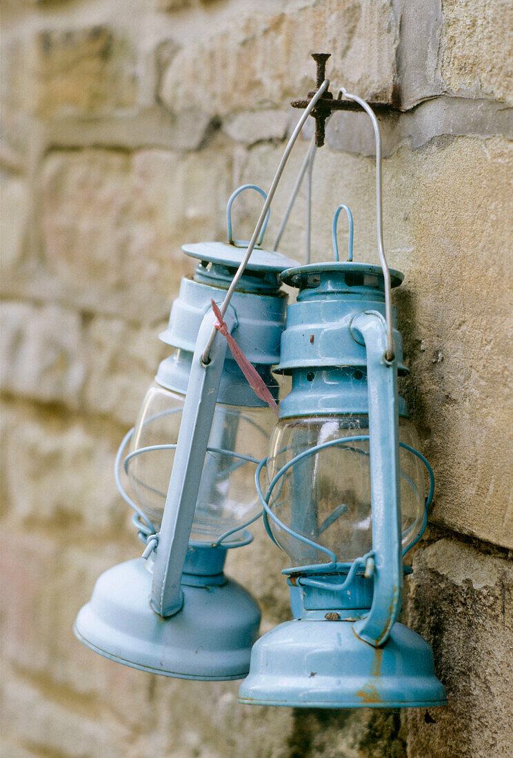 Pair of blue oil lamps