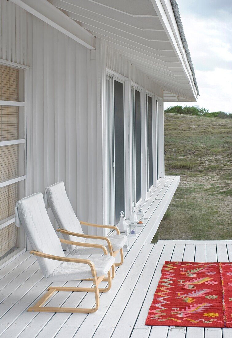 Uruguay, Manantiales, chairs outside beach house