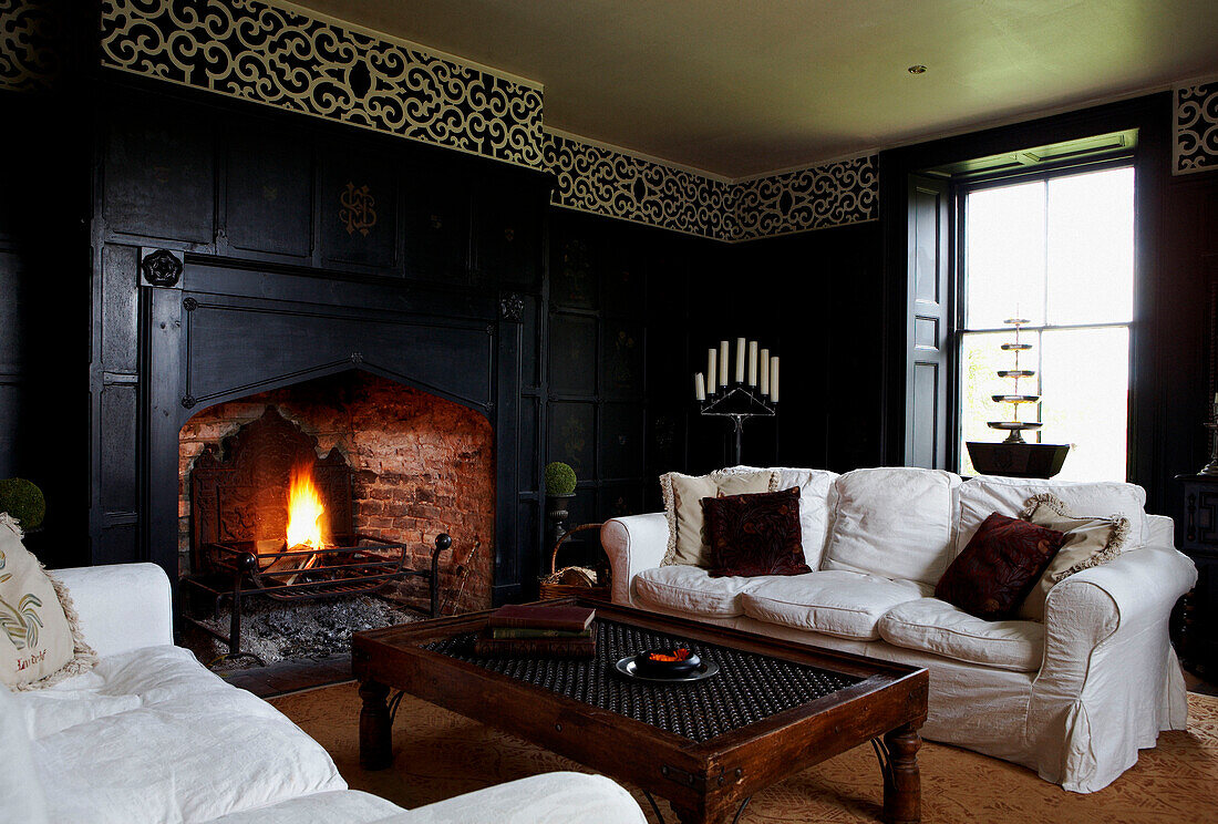 White sofas in black panelled Georgian farmhouse living room