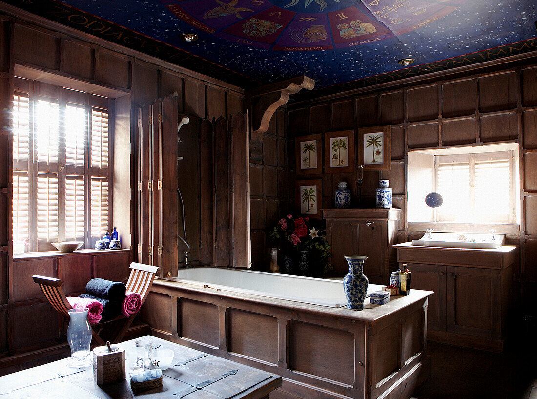 Panelled bathroom with zodiac painted ceiling in Georgian farmhouse