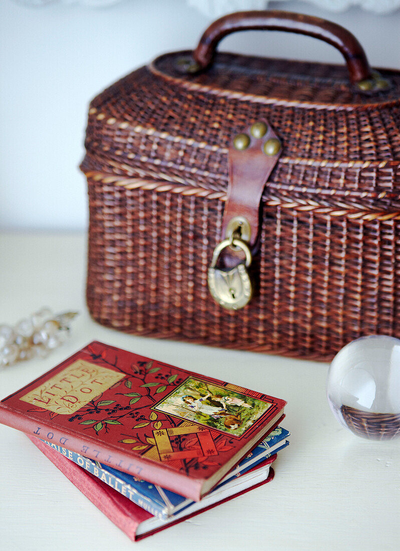 Padlocked basket and children's books