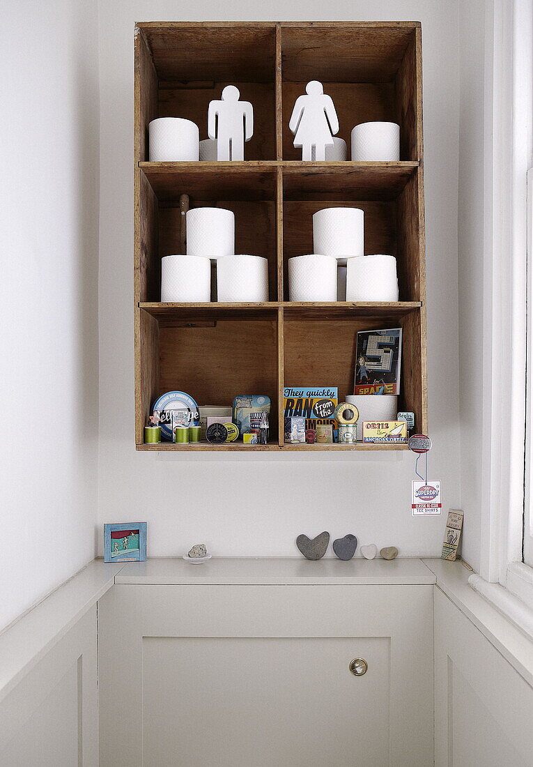 Storage shelving in bathroom of London family home UK