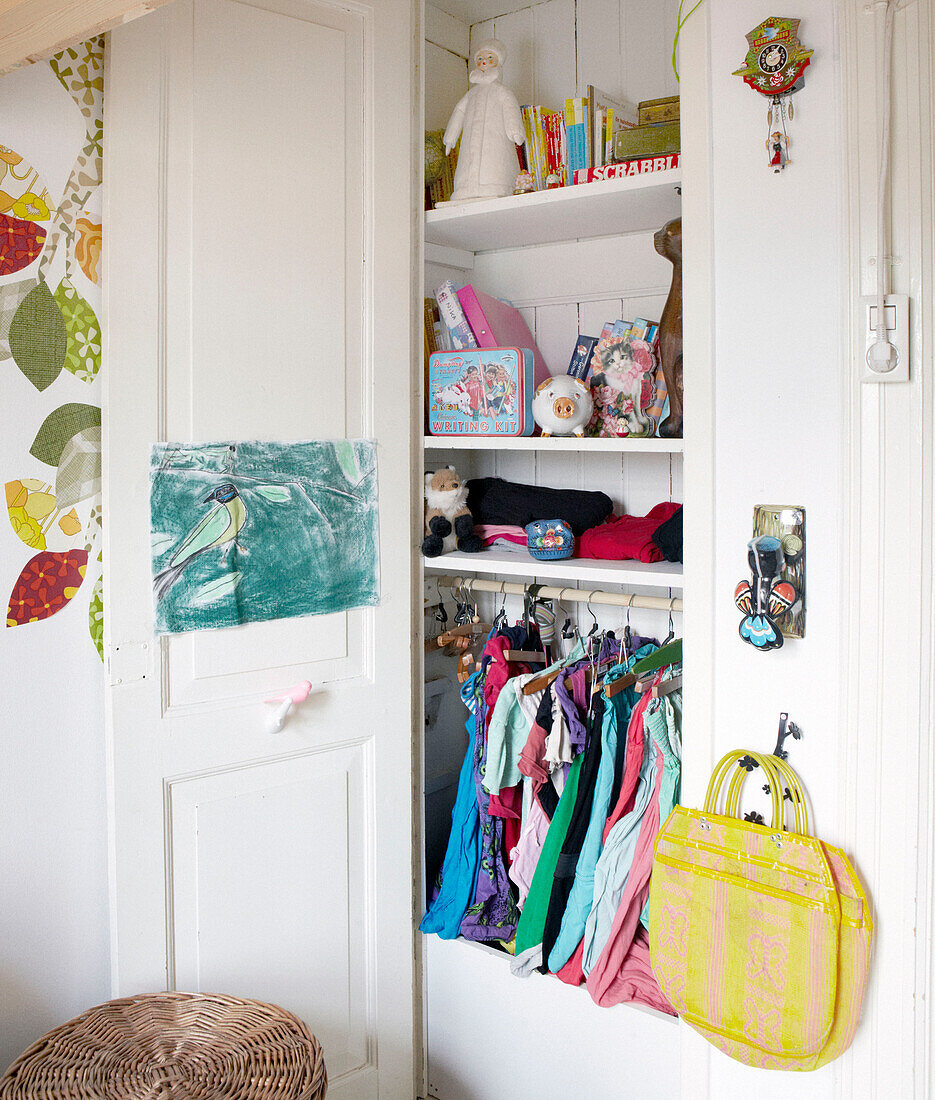 Childs wardrobe and toy cupboard in contemporary family home, Amsterdam, Netherlands