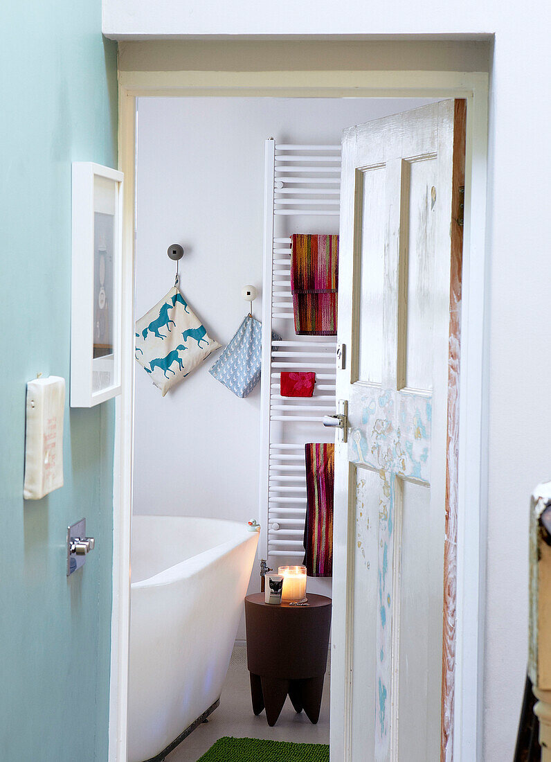 View through bathroom doorway in London home England UK