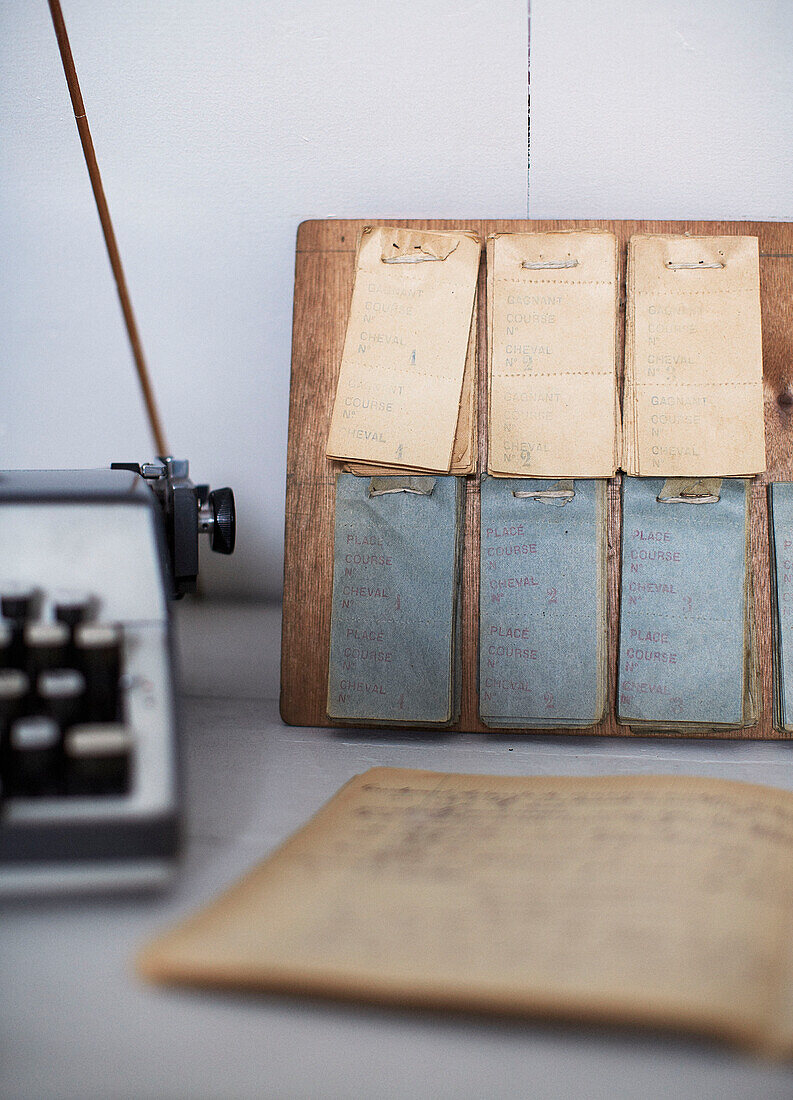 Exercise book and schoolboard on desk in schoolhouse conversion Brittany France