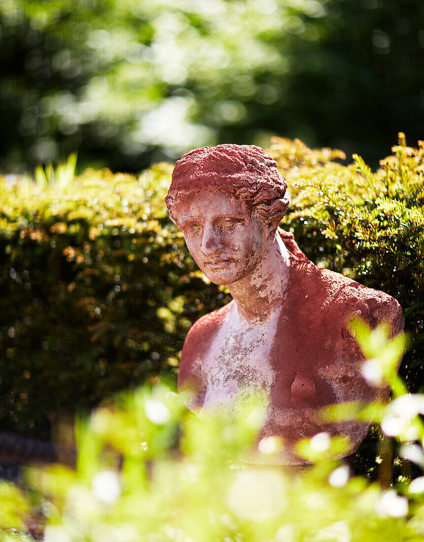 Male statue in garden of Welsh borders home UK