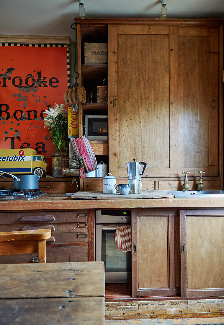 Wooden cupboards with vintage sign in Sunderland kitchen Tyne and Wear England UK