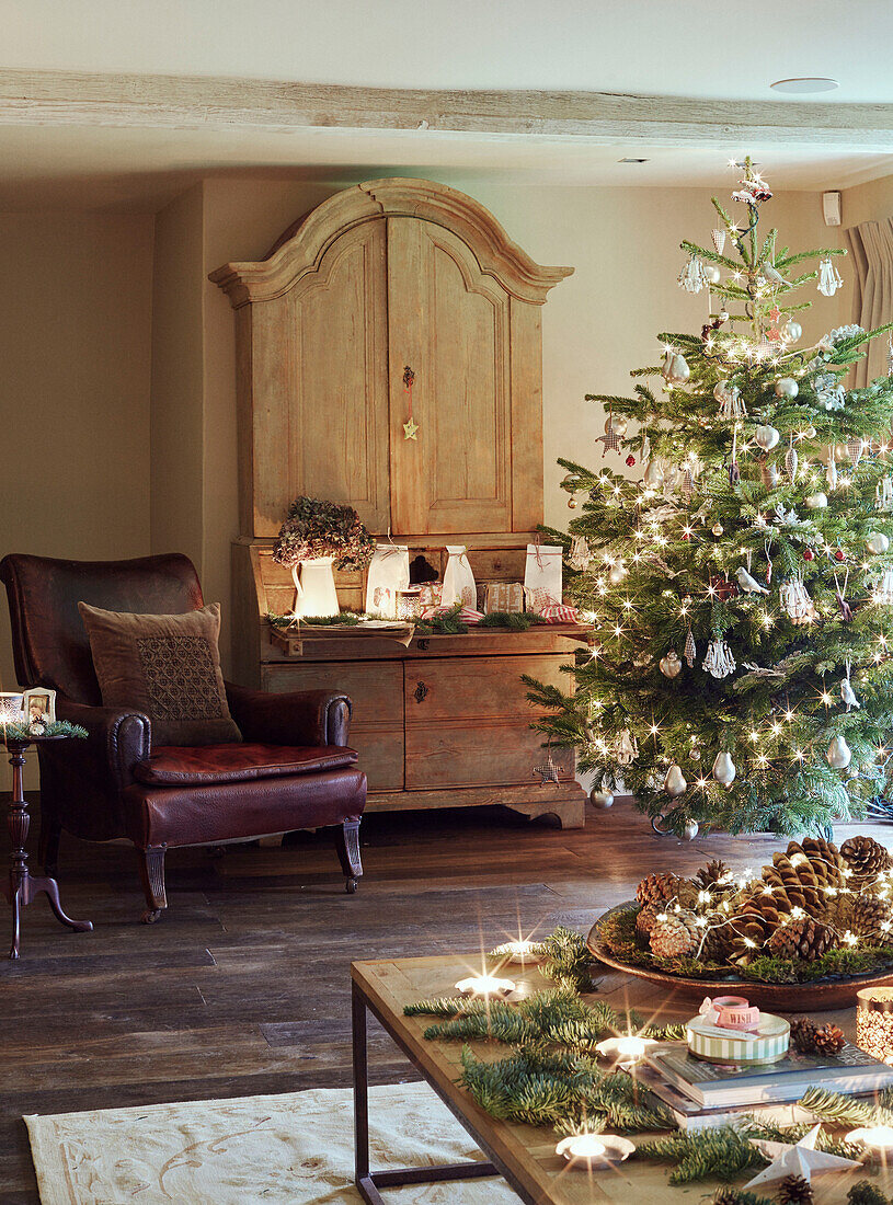 Christmas tree with armchair and dresser … – License image – 13545662 ...