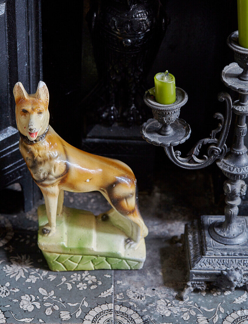 Ceramic fox and candlestick in fireplace Country Durham home, North East England