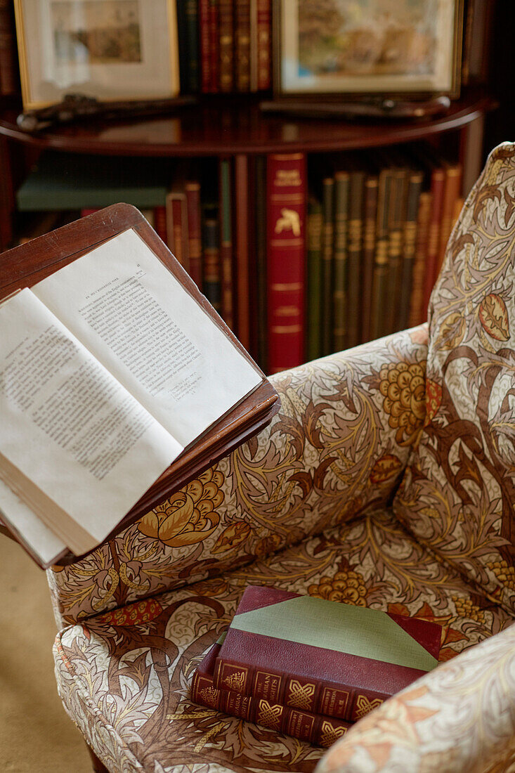 Open book on armchair in Capheaton Hall, Northumberland, UK
