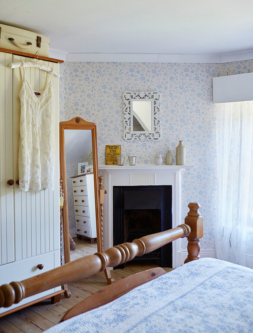 Negligee on wardrobe with full length mirror in bedroom of Northumberland cottage, Tyne and Wear, England, UK