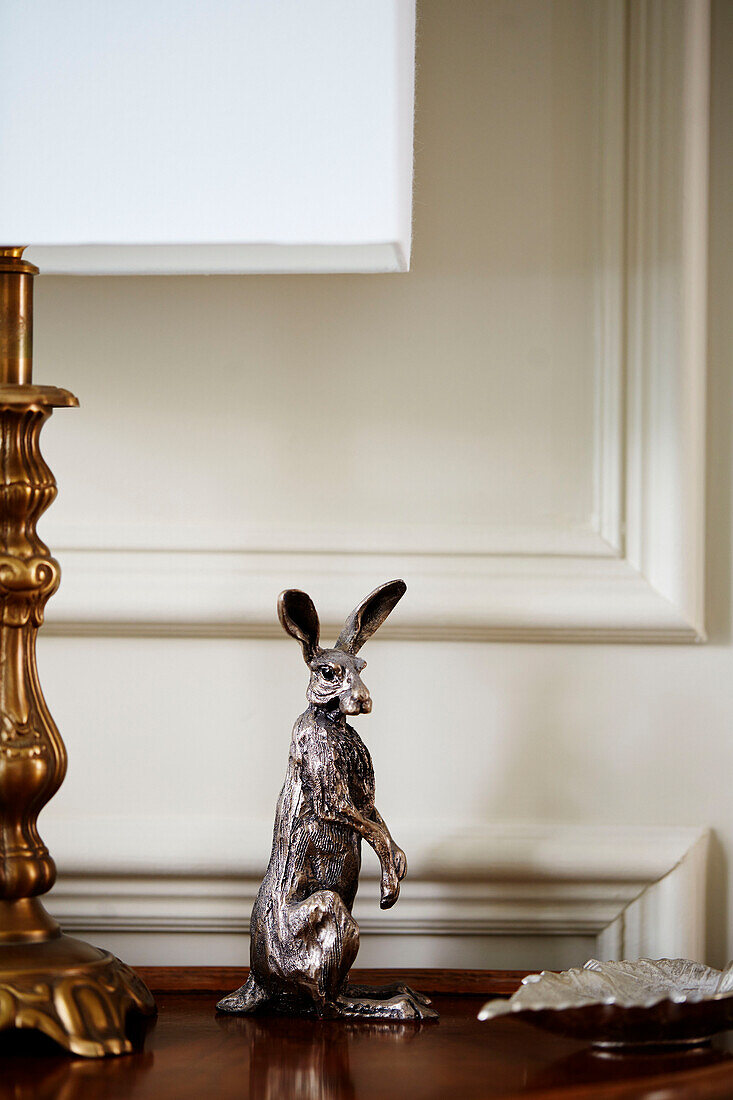 Hare ornament with gold lamp base in Durham home, England, UK