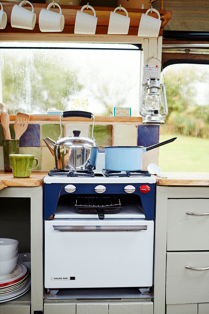 Gas stove inside The Majestic bus near Hay-on-Wye, Wales, UK