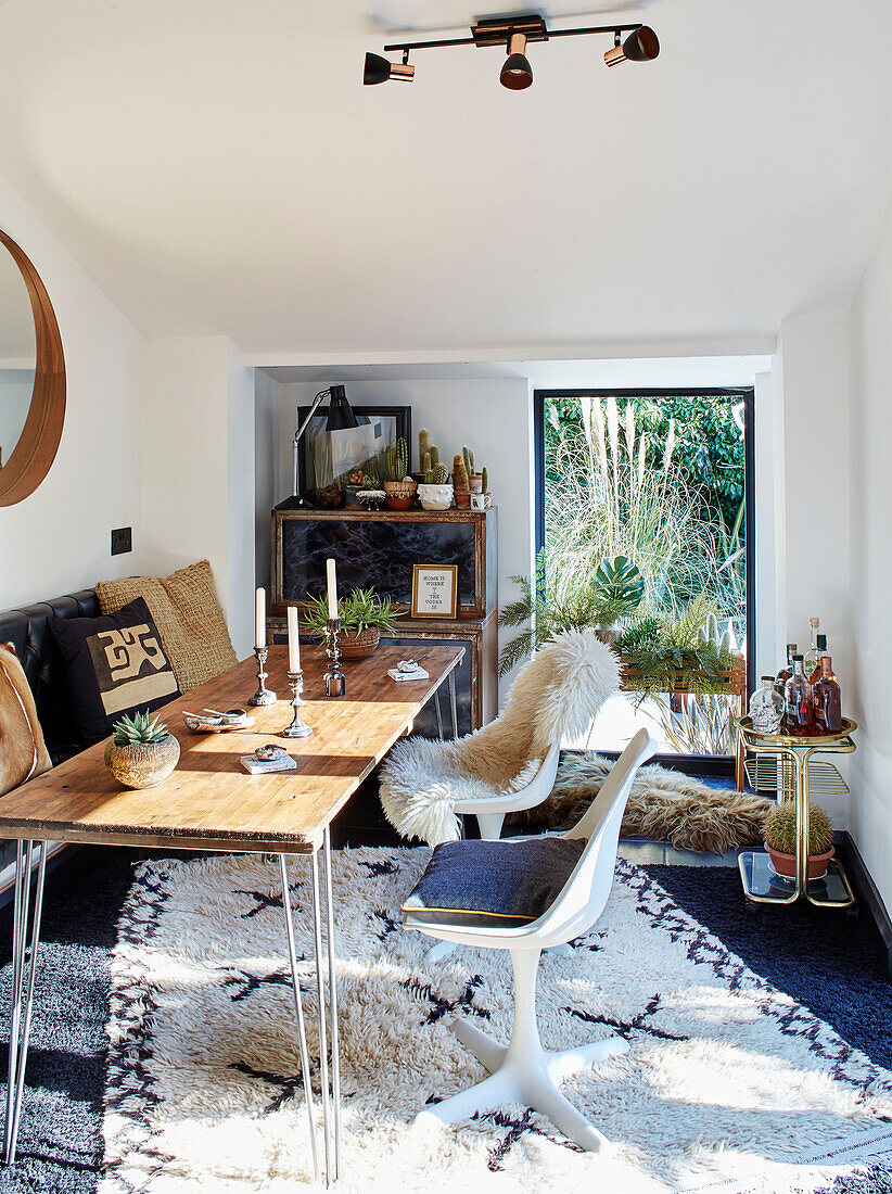 Wooden table and chairs in small dining room of Ramsgate home Kent, UK