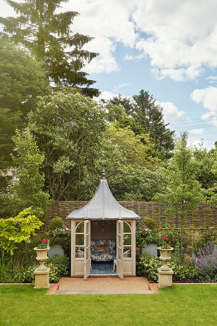 Summerhouse pavilion in Cotswolds garden, UK