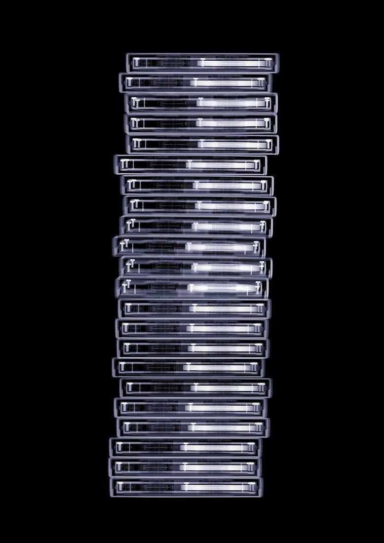 Stack of media storage cases, X-ray