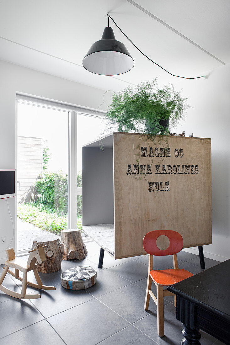 Wooden crate used to make a room within a room for children