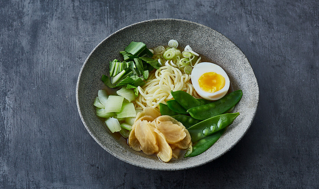 Ramen with yellow radish and bok choy