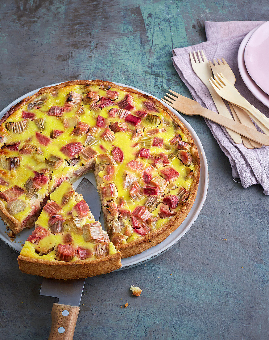 Moist rhubarb cake with an egg glaze