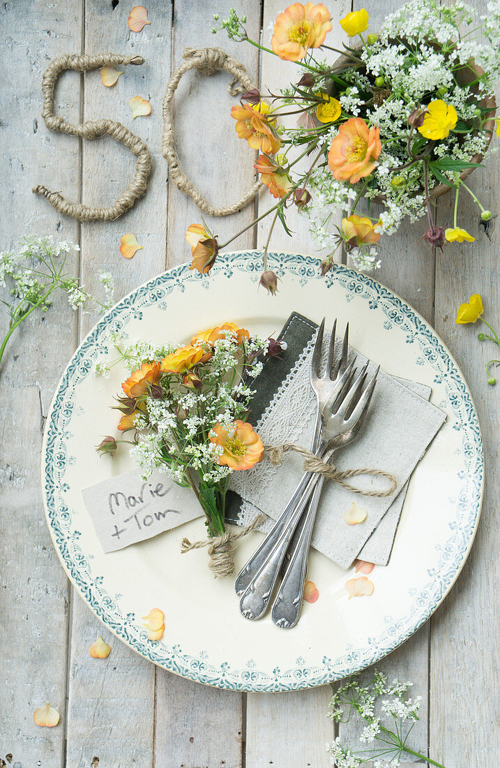 Birthday posy of geums, buttercups and cow parsley