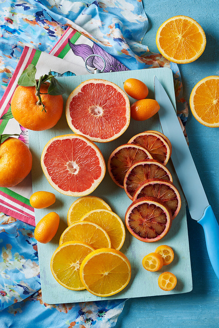 Various citrus fruit - mandarine, pink graefruit, kumquat, orange and blood orange