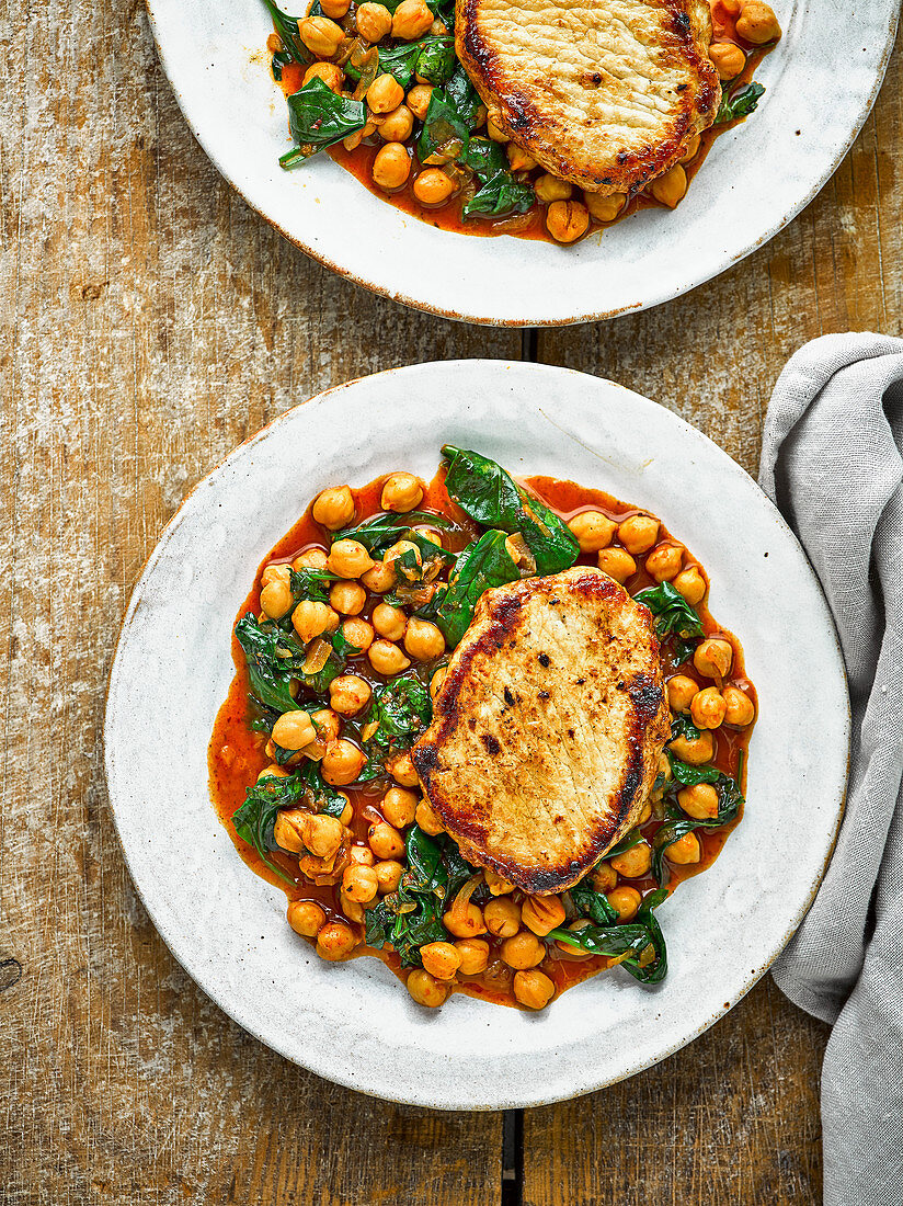 Healthy seared pork loin cutlets with harissa chickpeas