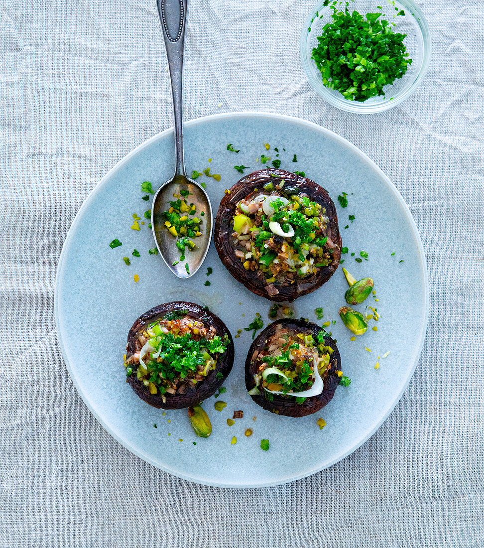 Stuffed mushrooms with herbs and pistachio nuts