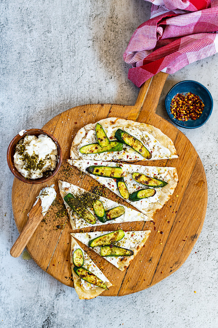 Barbecued Naan with small courgettes