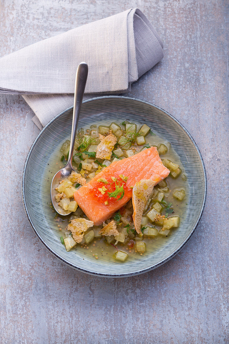 Salmon confit in a fennel sauce with bread and olives