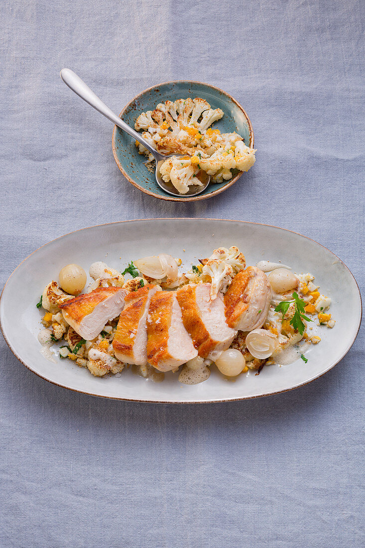 Corn-fed chicken breast with cauliflower and pearl onions