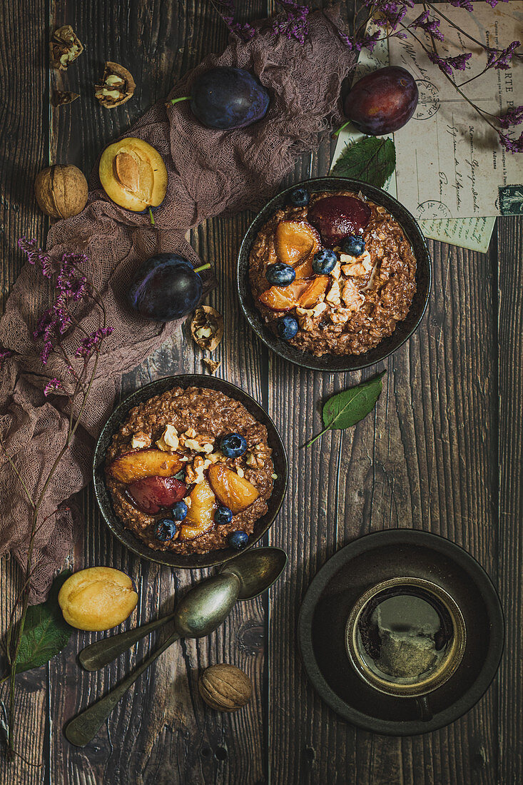 Chocolate porridge with caramelized plums