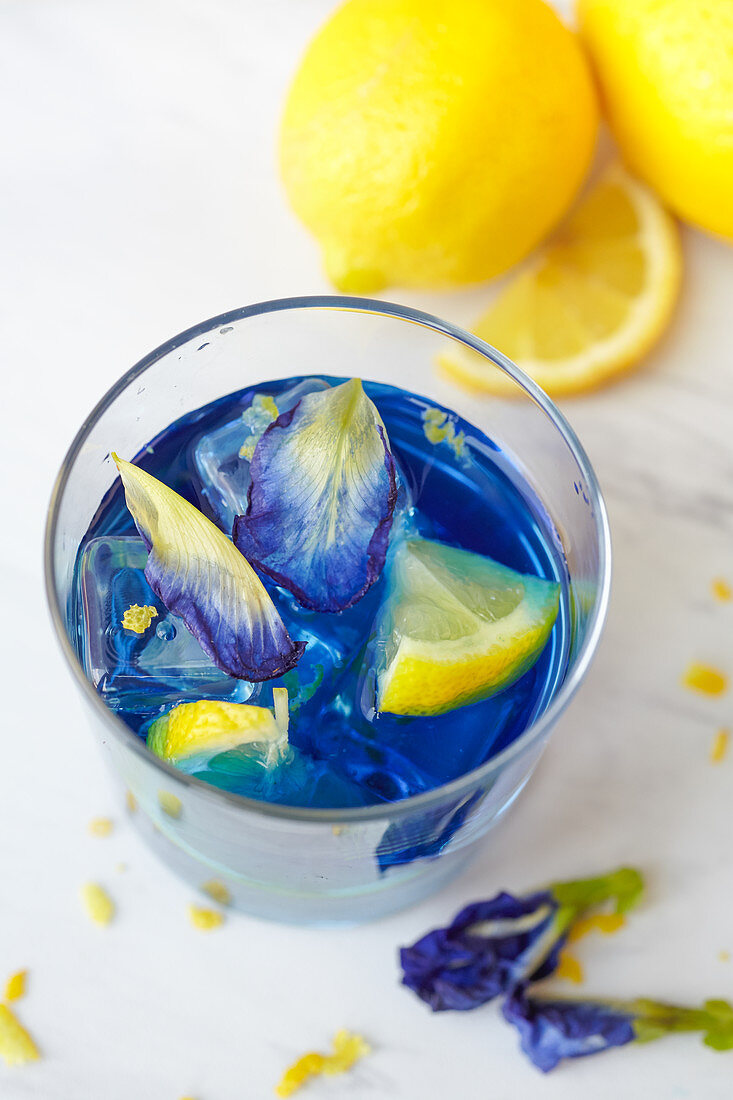 Butterfly pea cocktail with lemons and vodka (or gin)