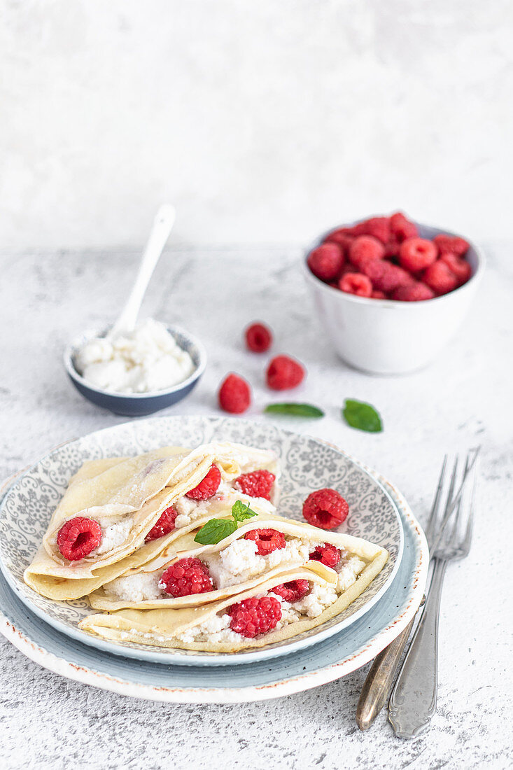 Pancakes with vegan coconut cottage cheese and raspberries