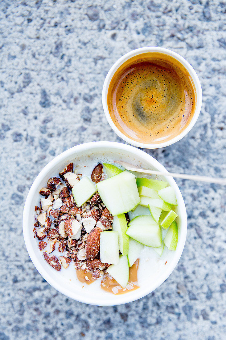 Porridge with almonds and apple and an espresso