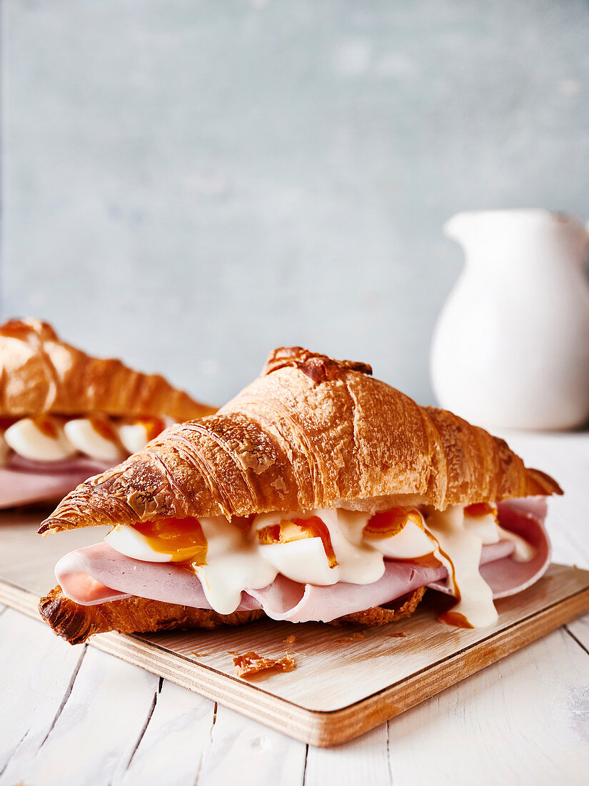 Croissants with cooked ham, boiled eggs and mayonnaise
