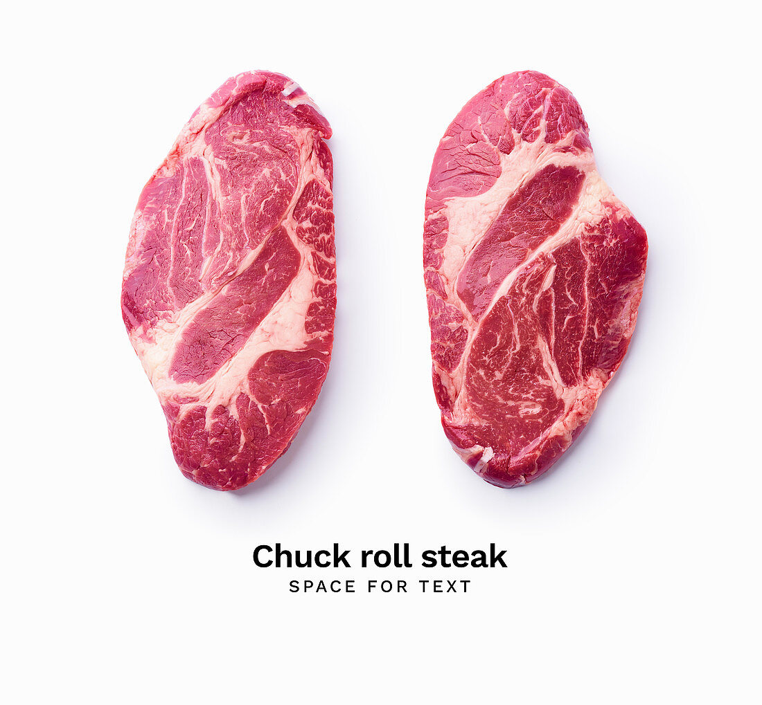 Black angus prime beef chuck roll steak isolated on white background with copy space