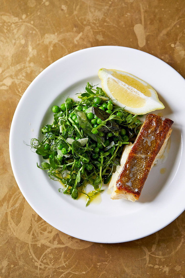Roast cod with slow-cooked English peas and shoots