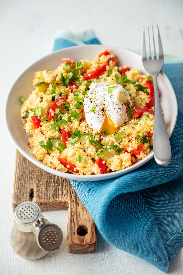 Millet with veggies and poached egg