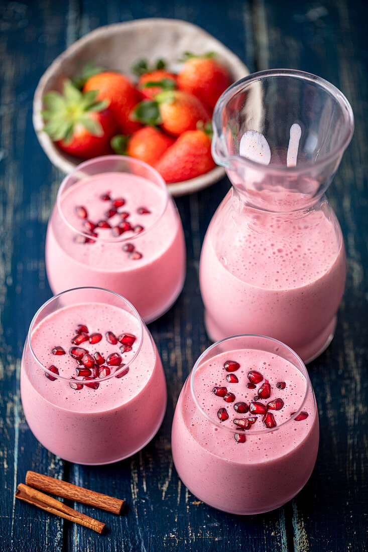 Strawberry coctail with cinnamon and pomegranate