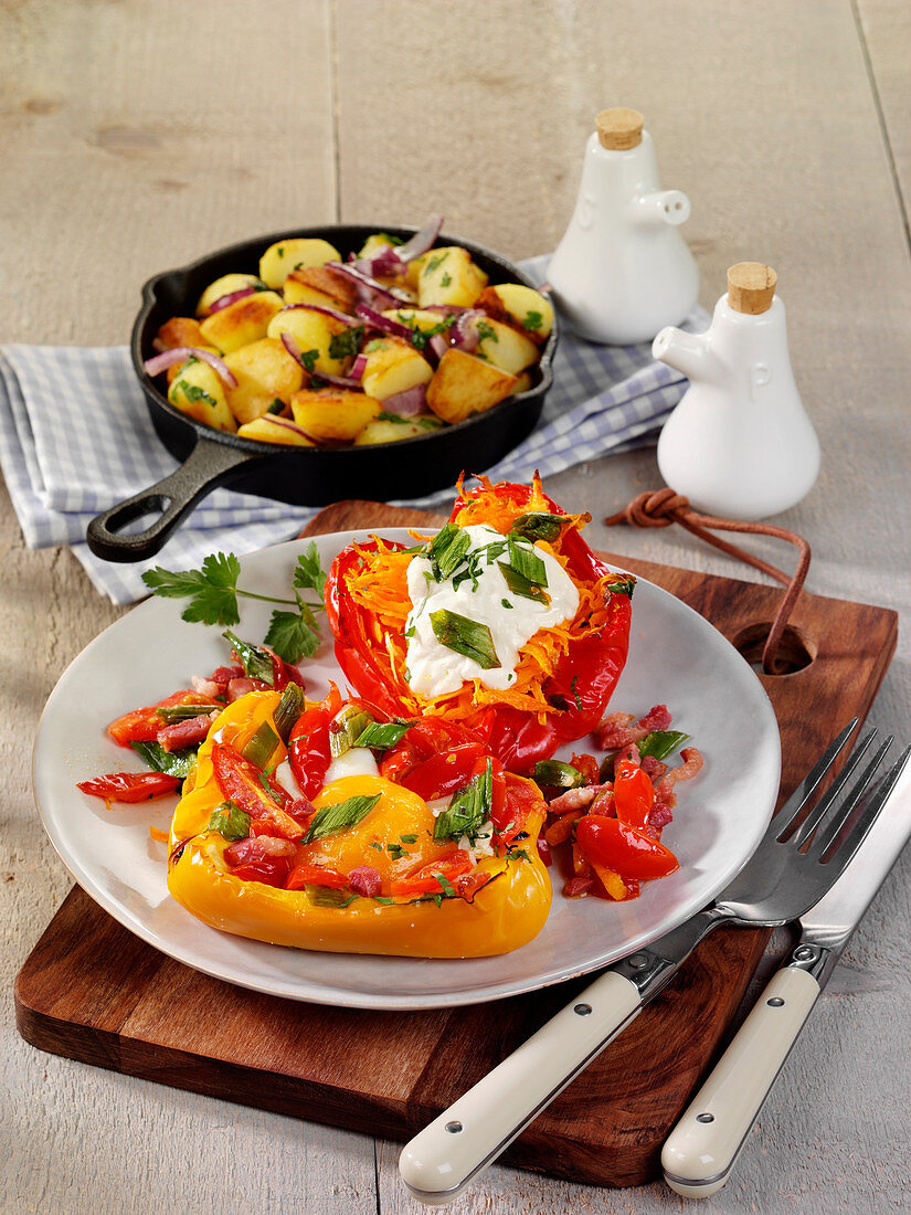 Stuffed peppers served with fried potatoes