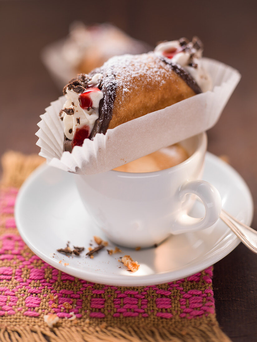 Cannoli on a coffee cup