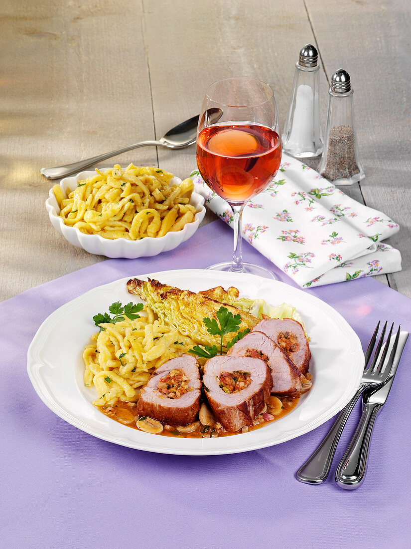 Stuffed pork fillet with spaetzle and roasted cabbage