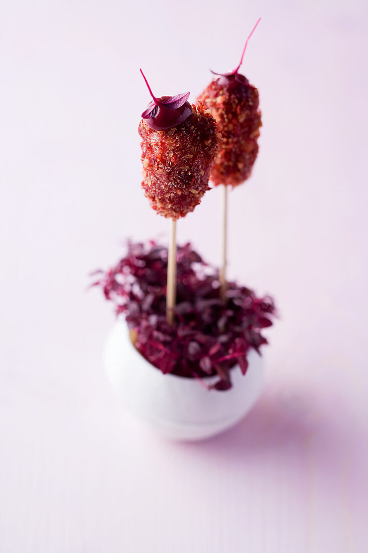 Octopus and juniper fritters with raspberry mustard